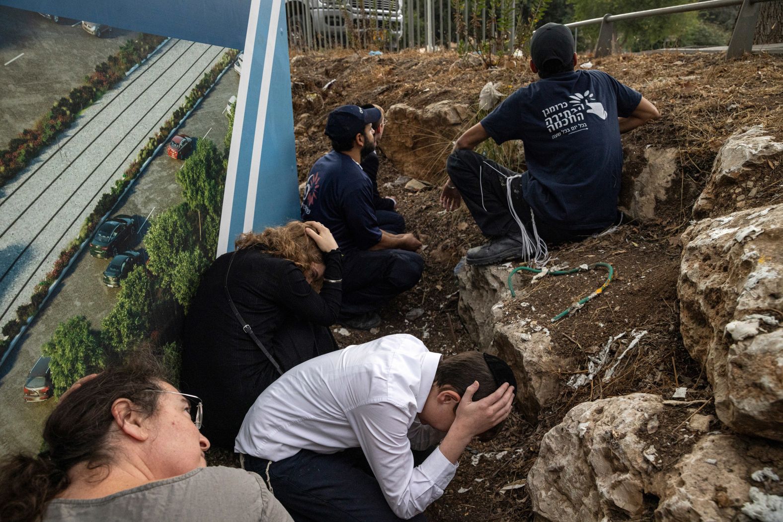 People take shelter in Jerusalem on October 9.