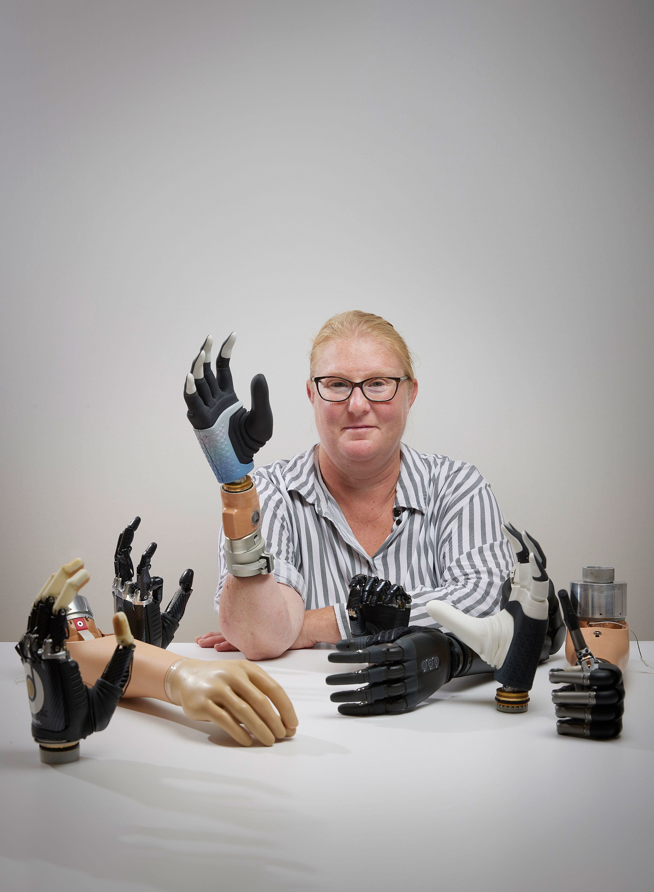 https://media.cnn.com/api/v1/images/stellar/prod/231010141601-01-woman-first-bionic-hand-ai.jpg?c=original