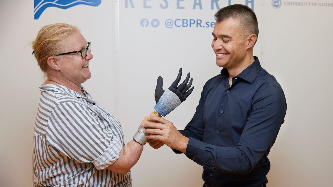Karin with her integrated bionic hand and Prof. Max Ortiz Catalan EMBARGOED UNTIL 2PM ET 10/11/23
