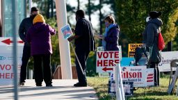 Voters are assisted at a polling location at the South Regional Library in Durham, N.C., Nov. 3, 2020. (AP Photo/Gerry Broome, File)