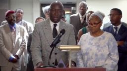  Marsha Ervin, right, stands next to Ben Crump during a news conference on Tuesday, October 10.