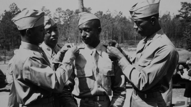 2nd Lt. Henry C. Harris, Jr., 2nd Lt. Rogers H. Beardon, 2nd Lt. Frank Frederick Doughton and 2nd Lt. Elmer B. Kountze following graduation at Fort Benning in Georgia, May 29, 1942.