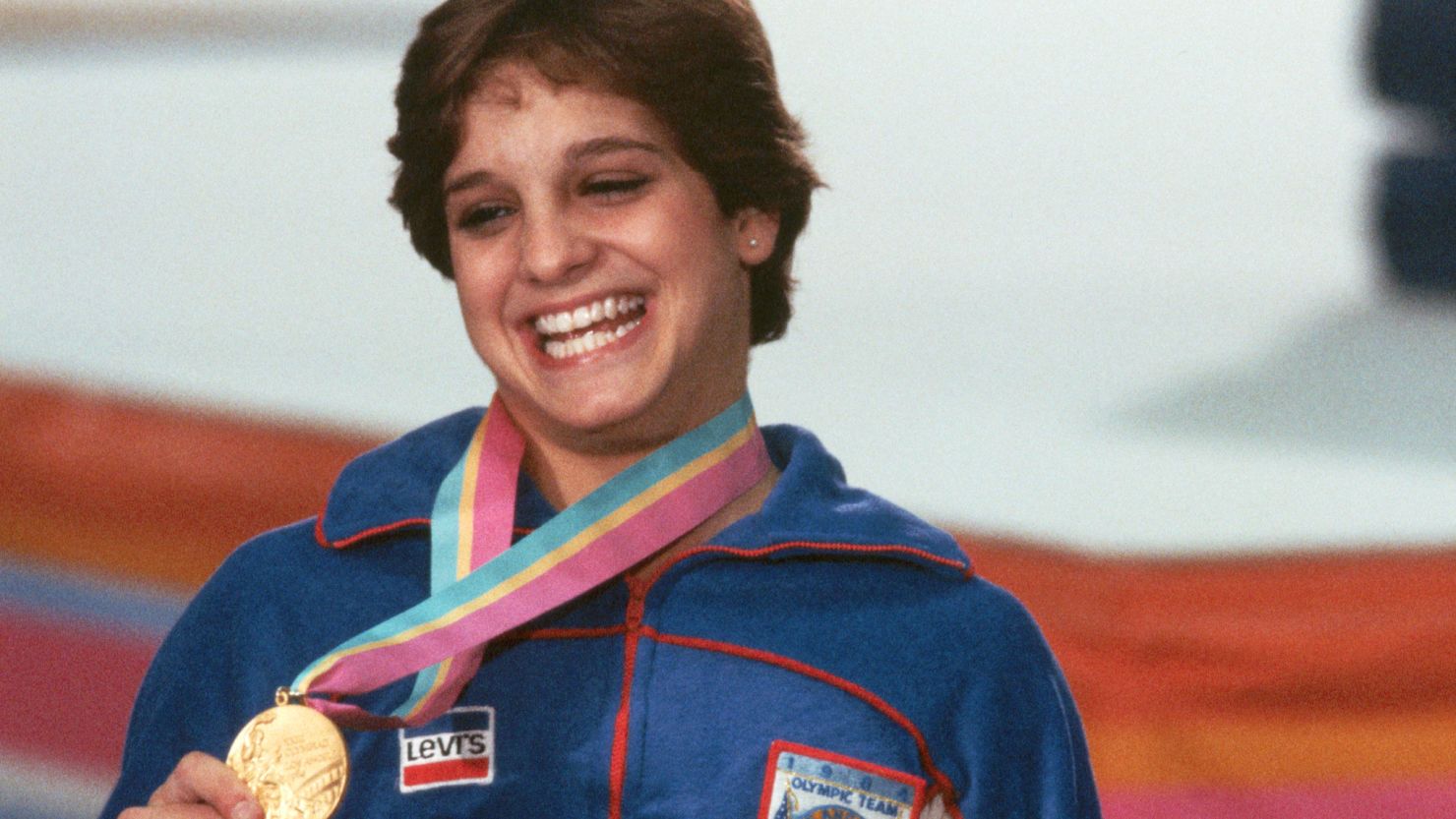 Gold medal winner Mary Lou Retton poses for a photograph after the awards ceremony for the Women's Gymnastics Combined event at the 1984 Los Angeles Summer Olympic Games.