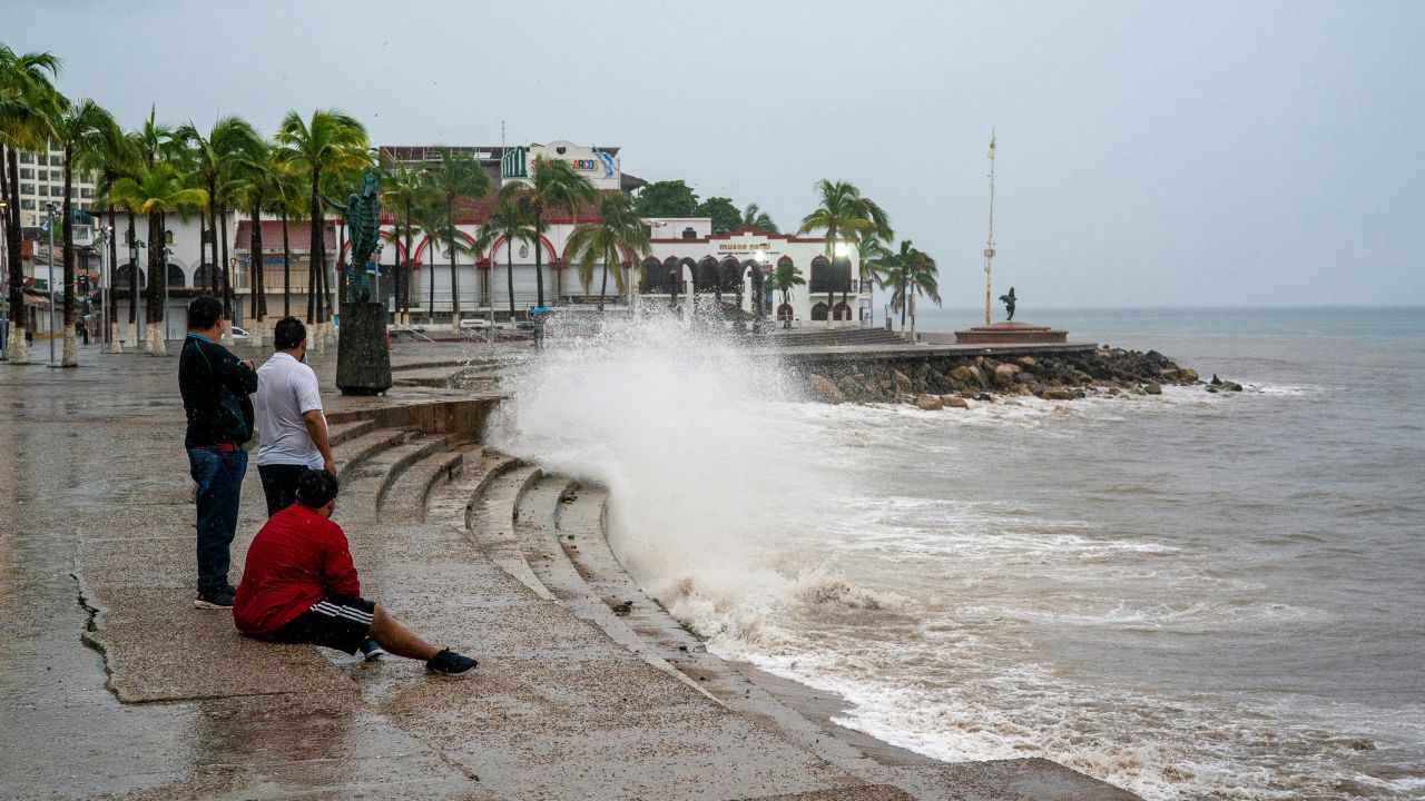 Waves crash against an ocean pier in Puerto Vallarta as Hurricane Lidia barreled towards Mexico's Pacific coast Tuesday.