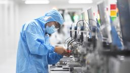 A technician tests a semiconductor seal in a production operation in Guiyang, Guizhou province, China, August 16, 2023. 