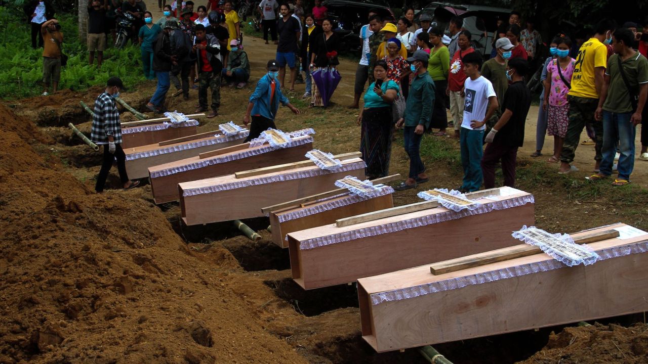 Coffins at a mass funeral to bury victims of a military strike on a camp for displaced people near the northern Myanmar town of Laiza on October 10.