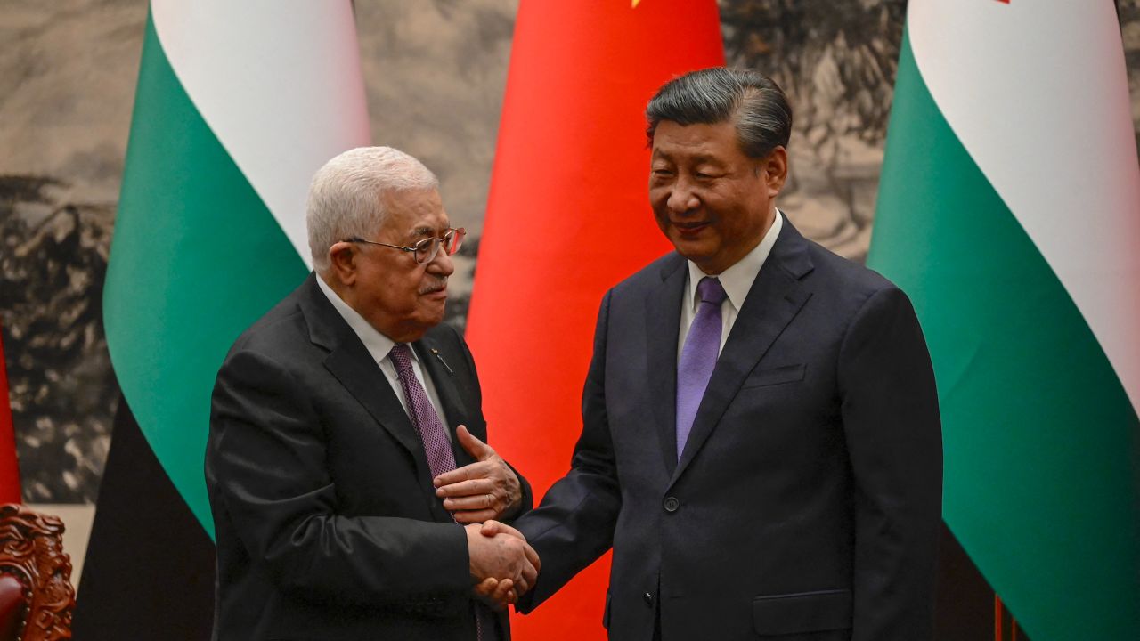Palestinian President Mahmud Abbas shakes hands with China's leader Xi Jinping in Beijing on June 14, 2023.