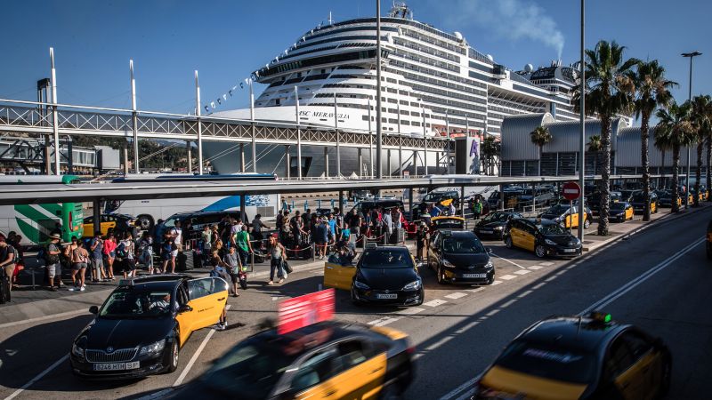 NextImg:Barcelona pushes cruise ships out of its city center | CNN