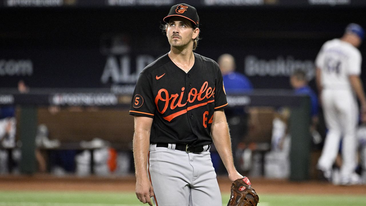 Oct 10, 2023; Arlington, Texas, USA; Baltimore Orioles starting pitcher Dean Kremer (64) is relieved in the second inning against the Texas Rangers during game three of the ALDS for the 2023 MLB playoffs at Globe Life Field. Mandatory Credit: Jerome Miron-USA TODAY Sports
