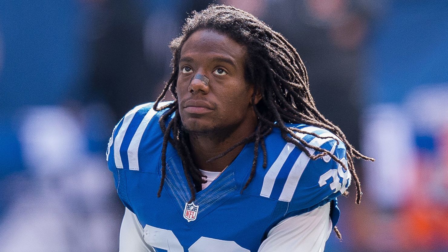Former NFL player Sergio Brown was taken into custody, a source said.