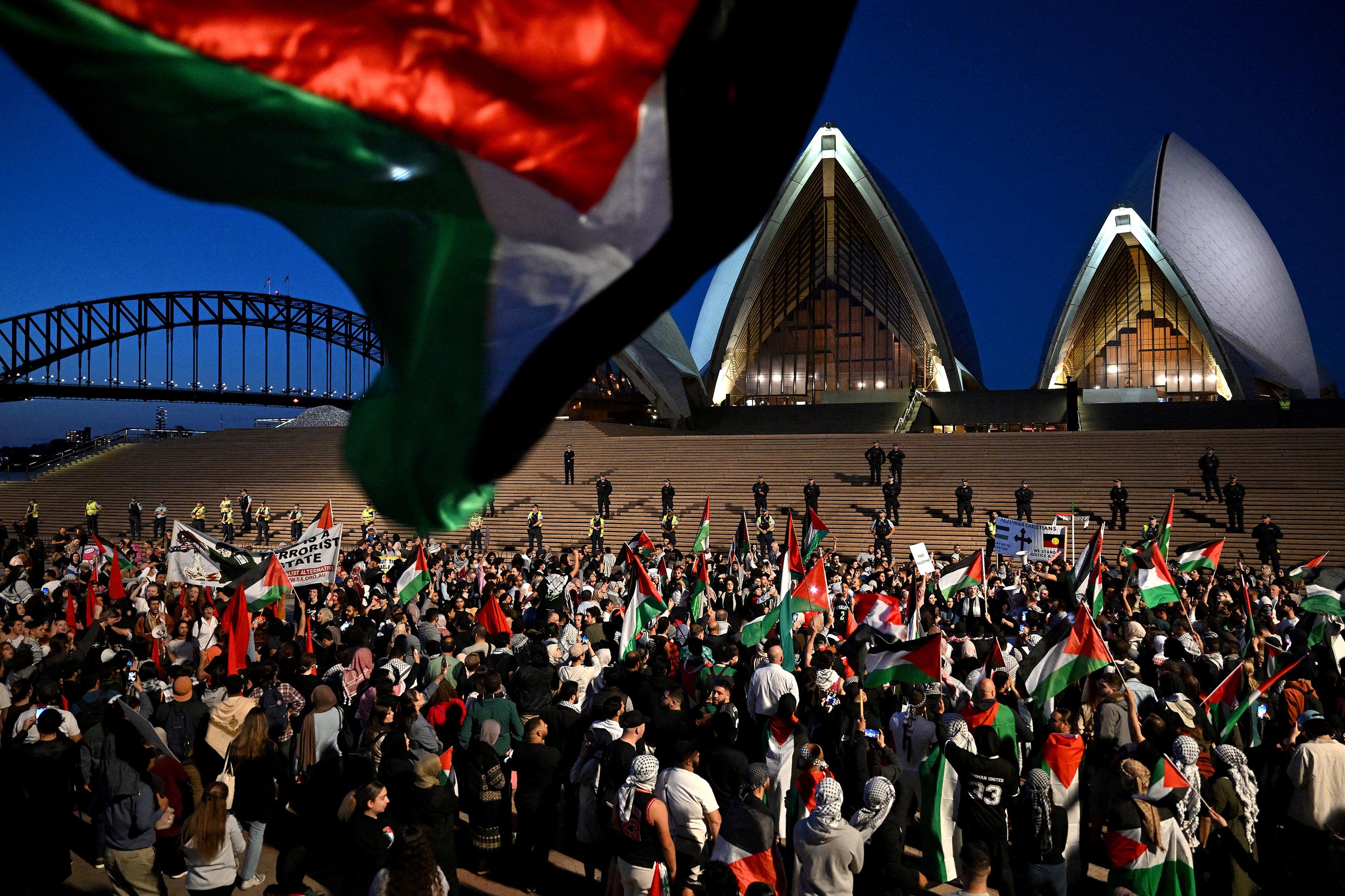 Supporters of Palestinians and Israel protest and pray around the