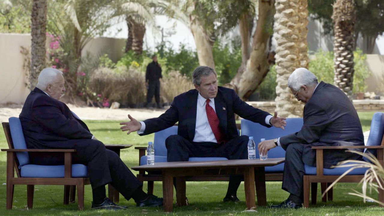 W. Bush, Israeli Prime Minister Ariel Sharon, and Palestinian leader Mahmoud Abbas met in 2003, in the Jordanian Red Sea resort of Aqaba. 