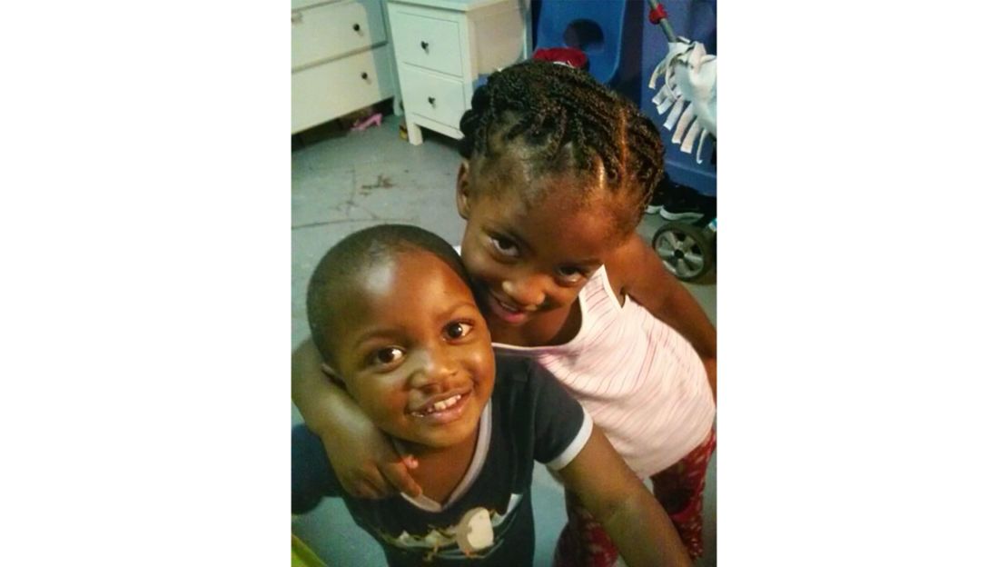 De'Evan (left) and his sister Angela, pictured here as toddlers, brought smiles to each other's faces, their mother said. 