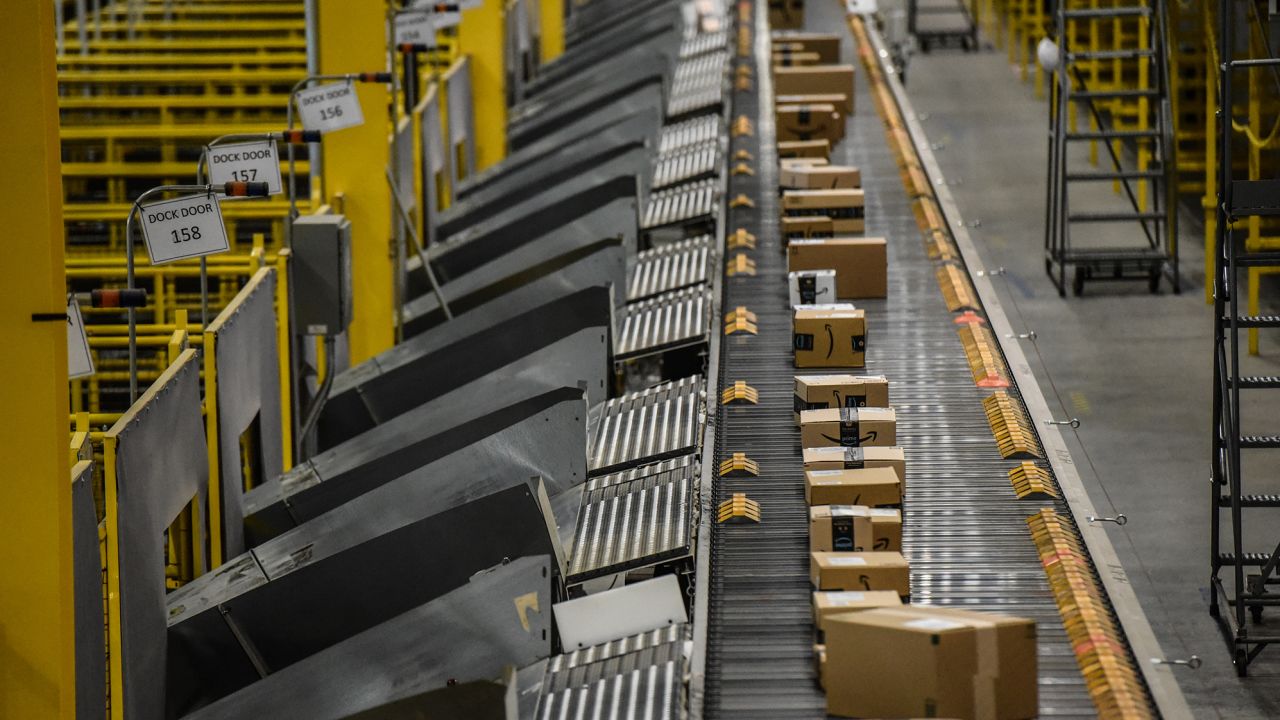 Packages move along a conveyor belt at an Amazon Fulfillment center on Cyber Monday in Robbinsville, New Jersey, in November 2022.