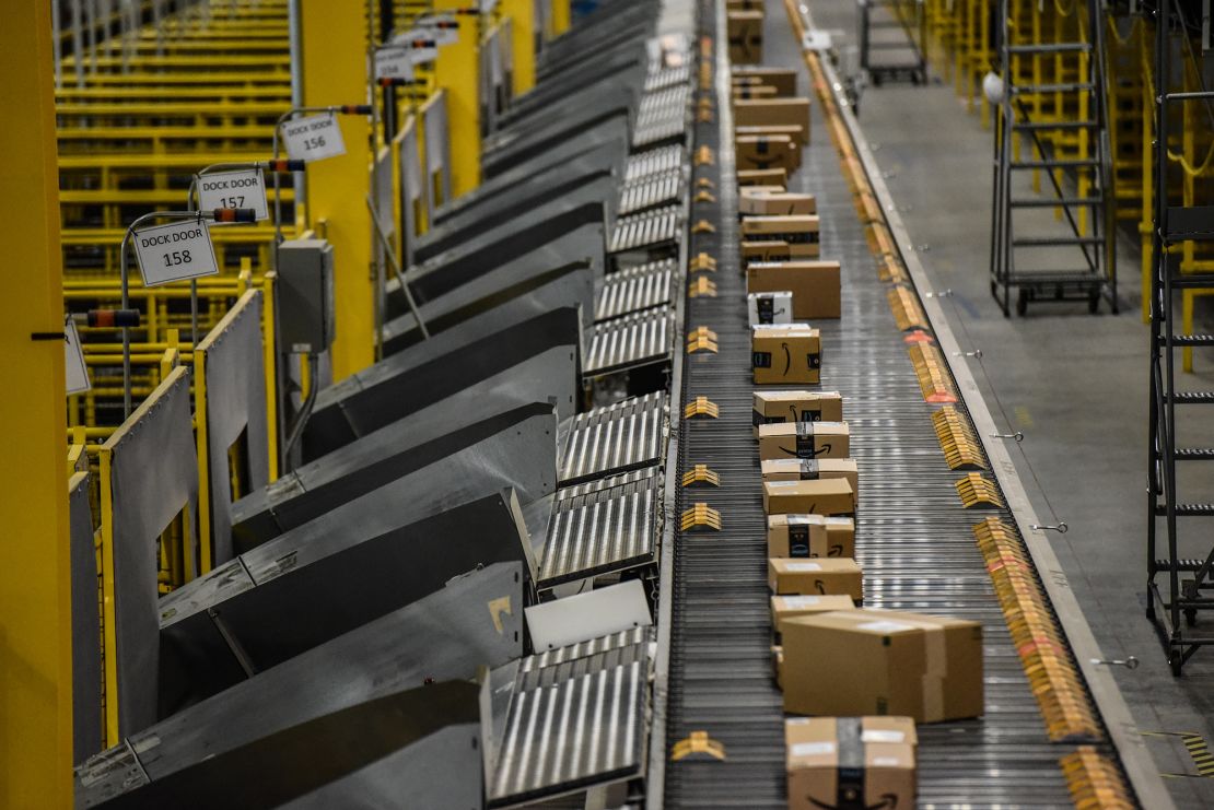 Packages move along a conveyor belt at an Amazon Fulfillment center on Cyber Monday in Robbinsville, New Jersey, in November 2022.
