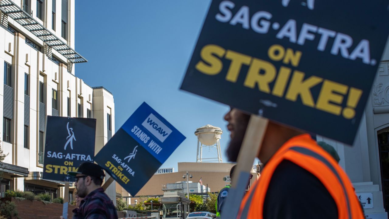 LOS ANGELES, CALIFORNIA - OCTOBER 11: Workers walking in a SAG-AFTRA picket line at the Sony Pictures Studios, on October 11, 2023 in Culver City, California. The WGA (Writers Guild of America) has reached a deal with Hollywood studios after 146 days on strike, ending their strike at midnight on September 27. SAG-AFTRA has not reached a deal with the studios and has been on strike since July 14. (Photo by Apu Gomes/Getty Images)