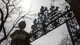 A gate stands in front of Harvard Yard on the closed Harvard University campus in Cambridge, Massachusetts, U.S., on Monday, April 20, 2020.