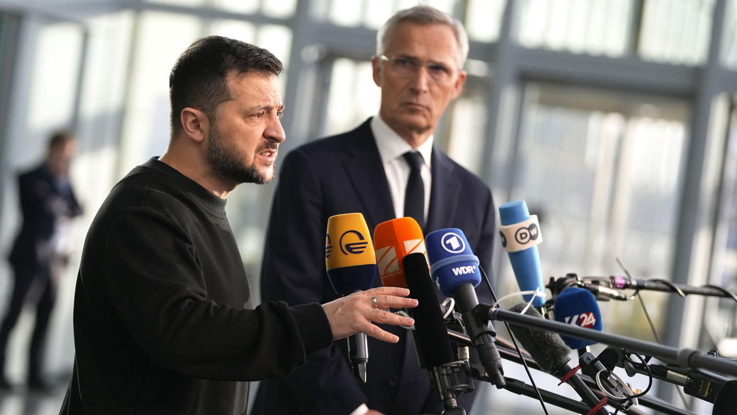 Ukraine's President Volodymyr Zelenskyy, left, speaks during a media conference with NATO Secretary General Jens Stoltenberg prior to a meeting of NATO defense ministers at NATO headquarters in Brussels on Wednesday.