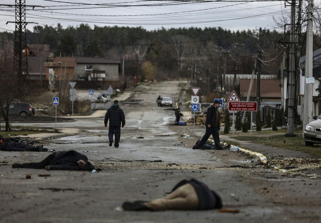 In this photo taken on April 2, 2022, bodies of civilians lie on Yablunska street in Bucha, northwest of Kyiv, after the Russian army pulled back from the city.