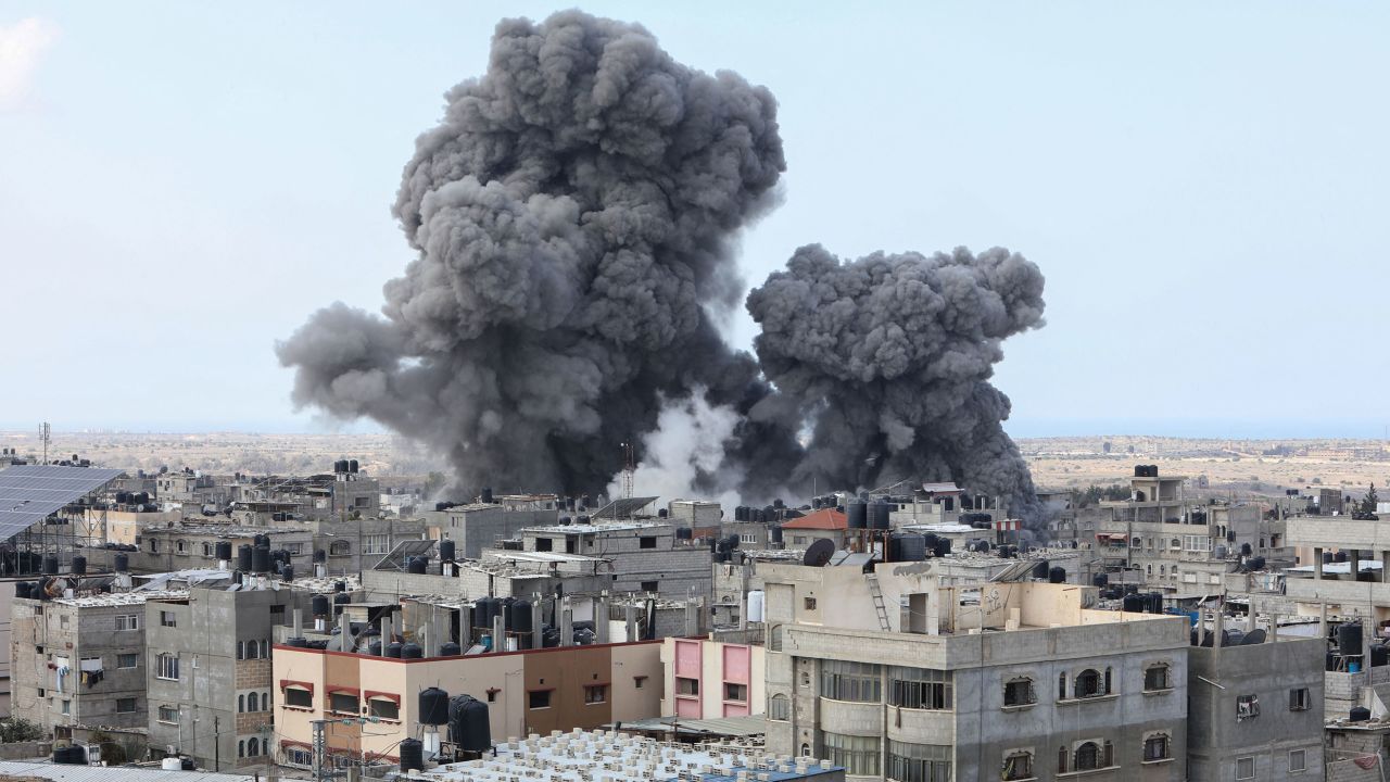 Smoke billows during an Israeli air strike in Rafah in  southern Gaza on October 12.