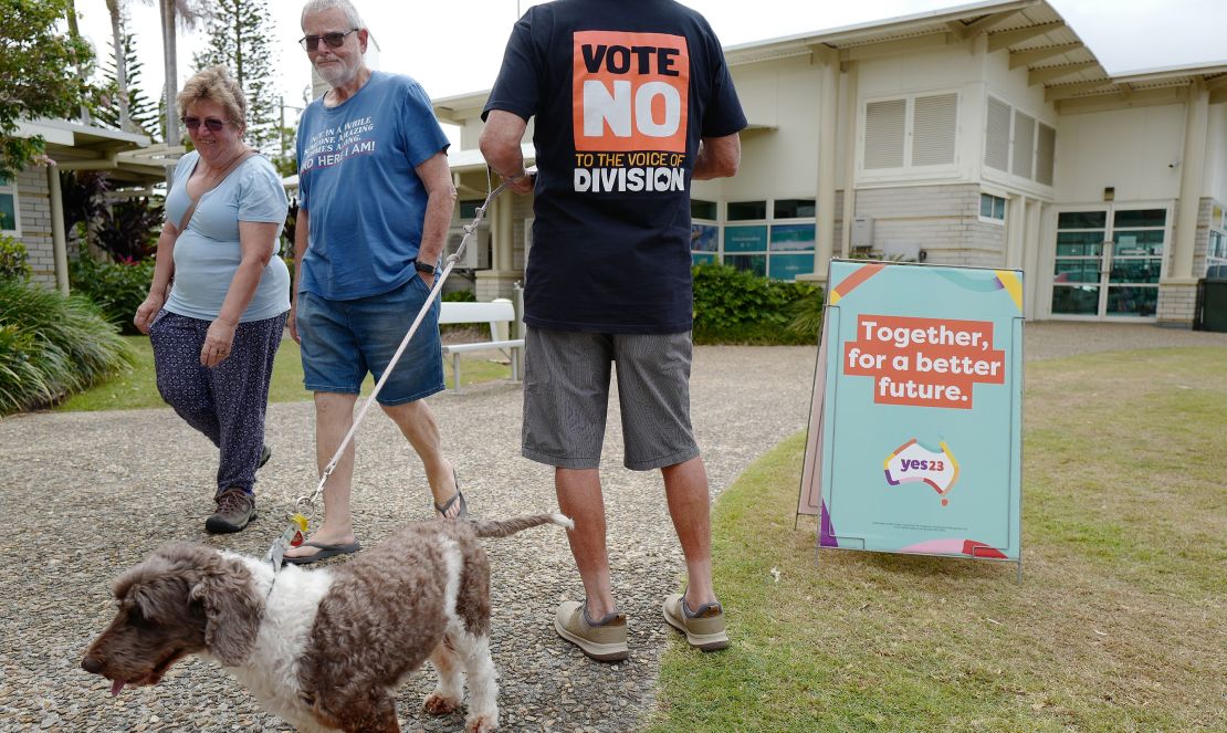 A No campaign worker hands out leaflets outside an early voting center on October 4, in Ballina, Australia. 