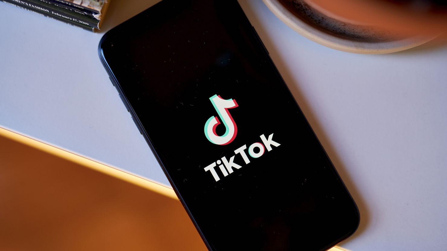 The TikTok logo on a smartphone