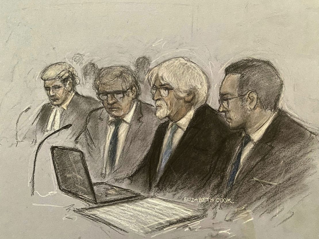 In this court artist sketch by Elizabeth Cook, former Formula One boss Bernie Ecclestone sits with his team in  court before being sentenced at Southwark Crown Court in London, Thursday, Oct. 12, 2023.  Ecclestone has been given a suspended prison sentence after he pleaded guilty to a fraud charge over his failure to declare millions of dollars held in a trust in Singapore. The 92-year-old billionaire agreed a civil settlement of 652.6 million pounds, or $803 million, over funds that were owed to Britain's tax office over the course of 18 years. Ecclestone was handed a 17-month term, suspended for two years, at Southwark Crown Court in London.   (Elizabeth Cook/PA  via AP)