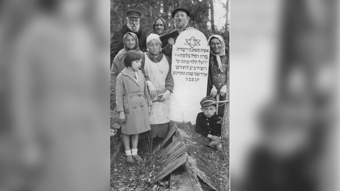 The tombstone is in Hebrew and translates as, "Here lies a significant and honest woman, Mrs. Zissel Malcah the daughter of Yoel Halevy who died at the hands of murderers on the twelfth day of Second Adar 5678 (March 14, 1919). May her soul be bound with the souls of the living."