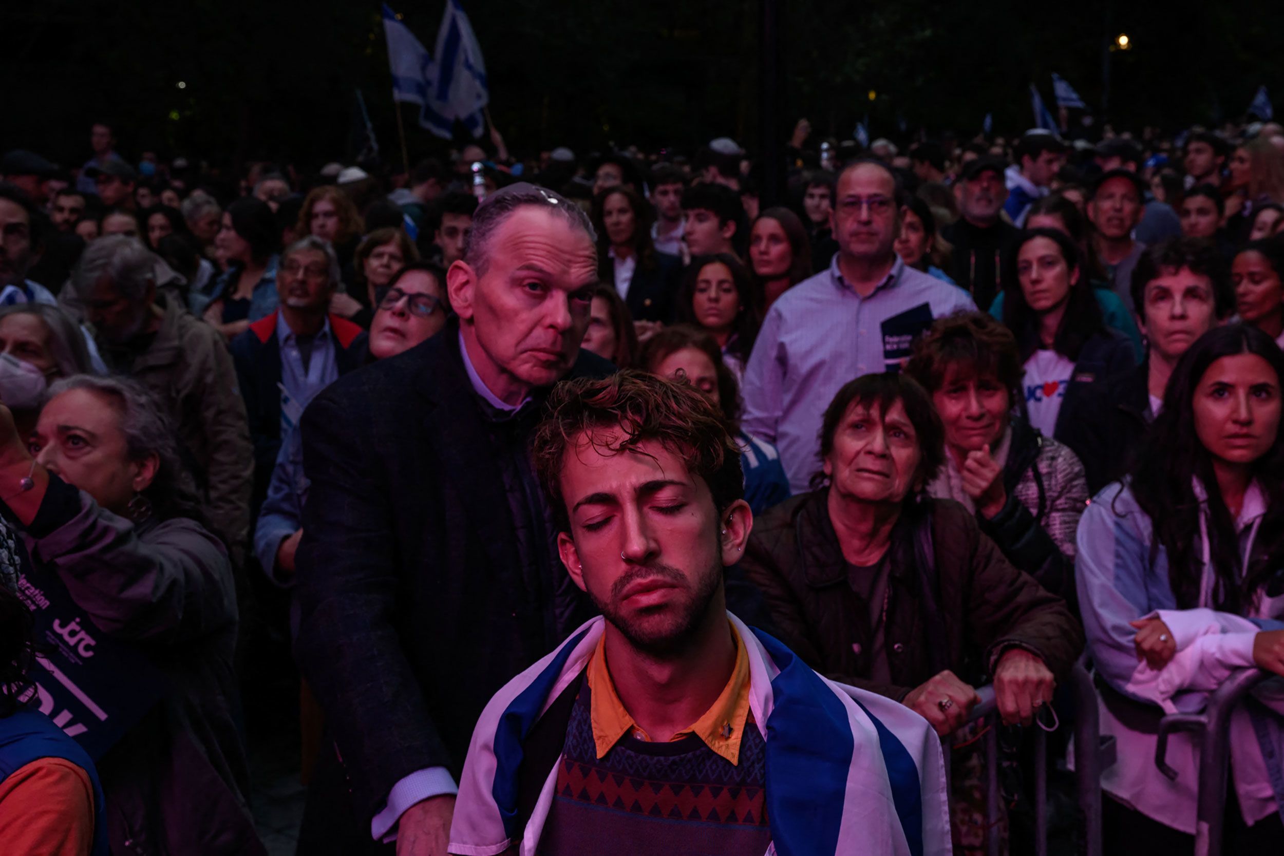 People in New York City attend a "Stand with Israel" vigil and rally on Tuesday, October 10.