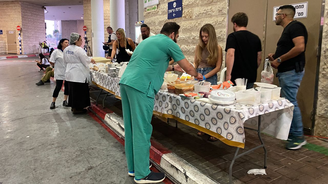 Volunteers serve snacks to staff in front of a hospital in Ashkelon, Israel.
