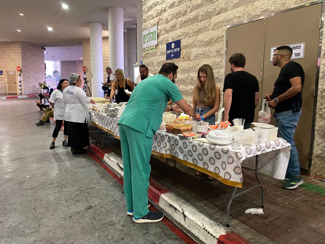 Volunteers serve snacks to staff in front of a hospital in Ashkelon, Israel.