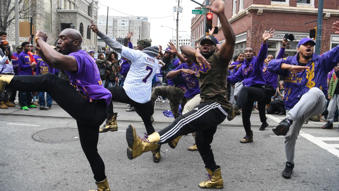 Members of Omega Psi Phi Fraternity, Inc. participate in the 2017 Martin Luther King Jr. Day March and Rally at the MLK Center on January 16, 2017 in Atlanta, Georgia.