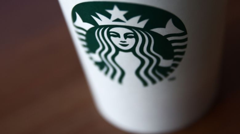 Starbucks Coffee logo is seen on a cup.