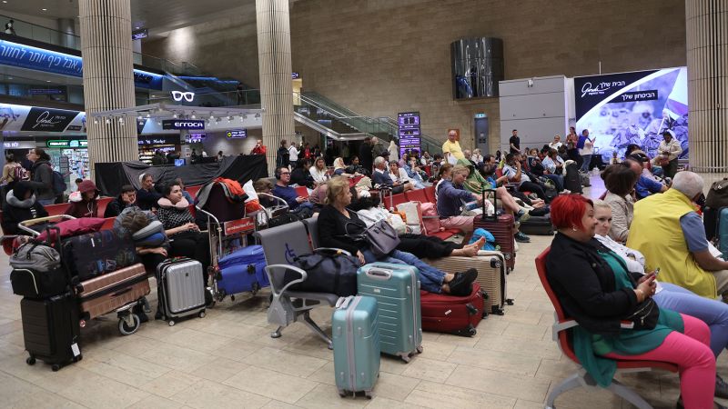 NextImg:Price hikes, hectic embassy guidelines and stranded pets: People struggle to find ways out of Israel | CNN Business