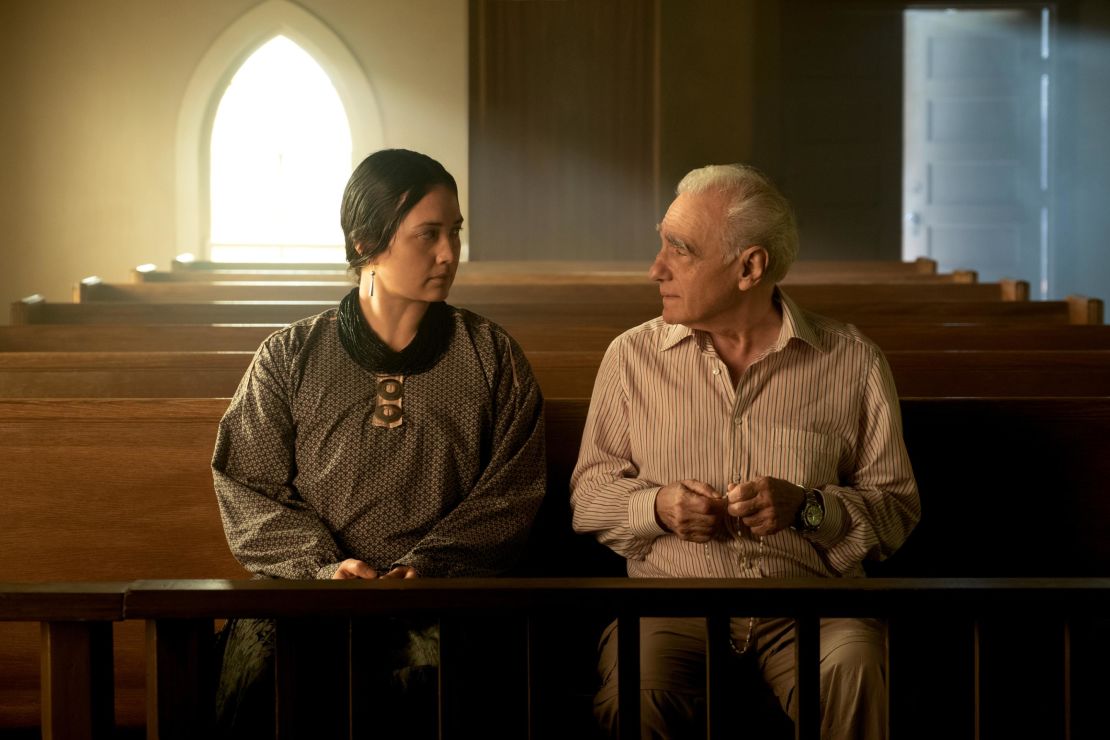 Lily Gladstone talks with Martin Scorsese inside a church on location for "Killers of the Flower Moon."