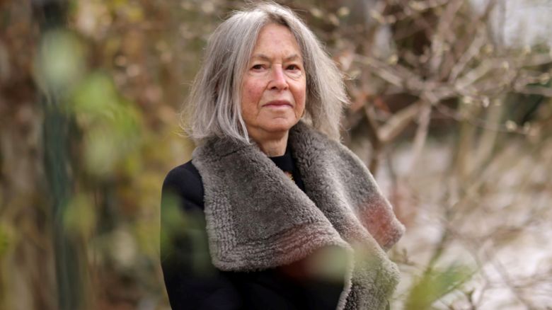 American poet Louise Gluck, winner of the 2020 Nobel Prize for Literature, poses outside her home in Cambridge, Massachusetts, U.S., in this undated handout image obtained by Reuters on December 7, 2020. © Nobel Prize Outreach/Daniel Ebersole/Handout via REUTERS  ATTENTION EDITORS - THIS IMAGE WAS PROVIDED BY A THIRD PARTY. MANDATORY CREDIT.