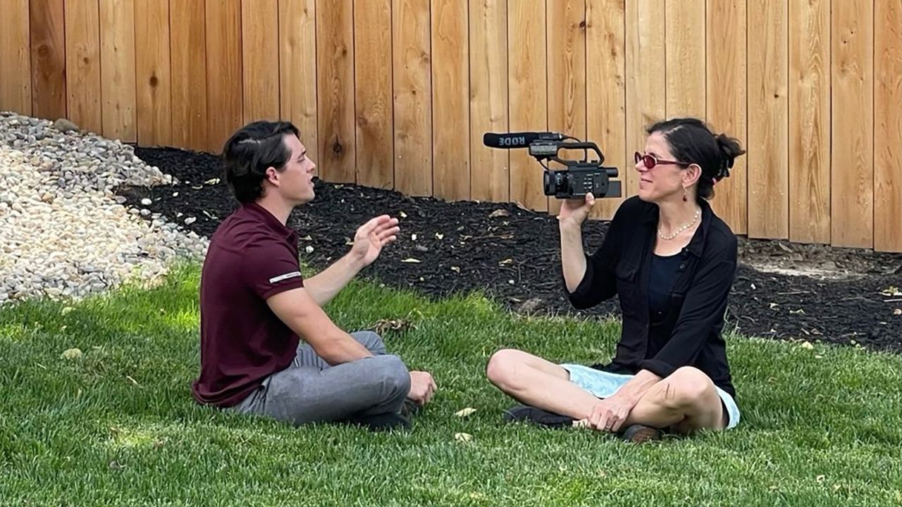 Alexandra Pelosi (right) conducts an interview in "The Insurrectionist Next Door."