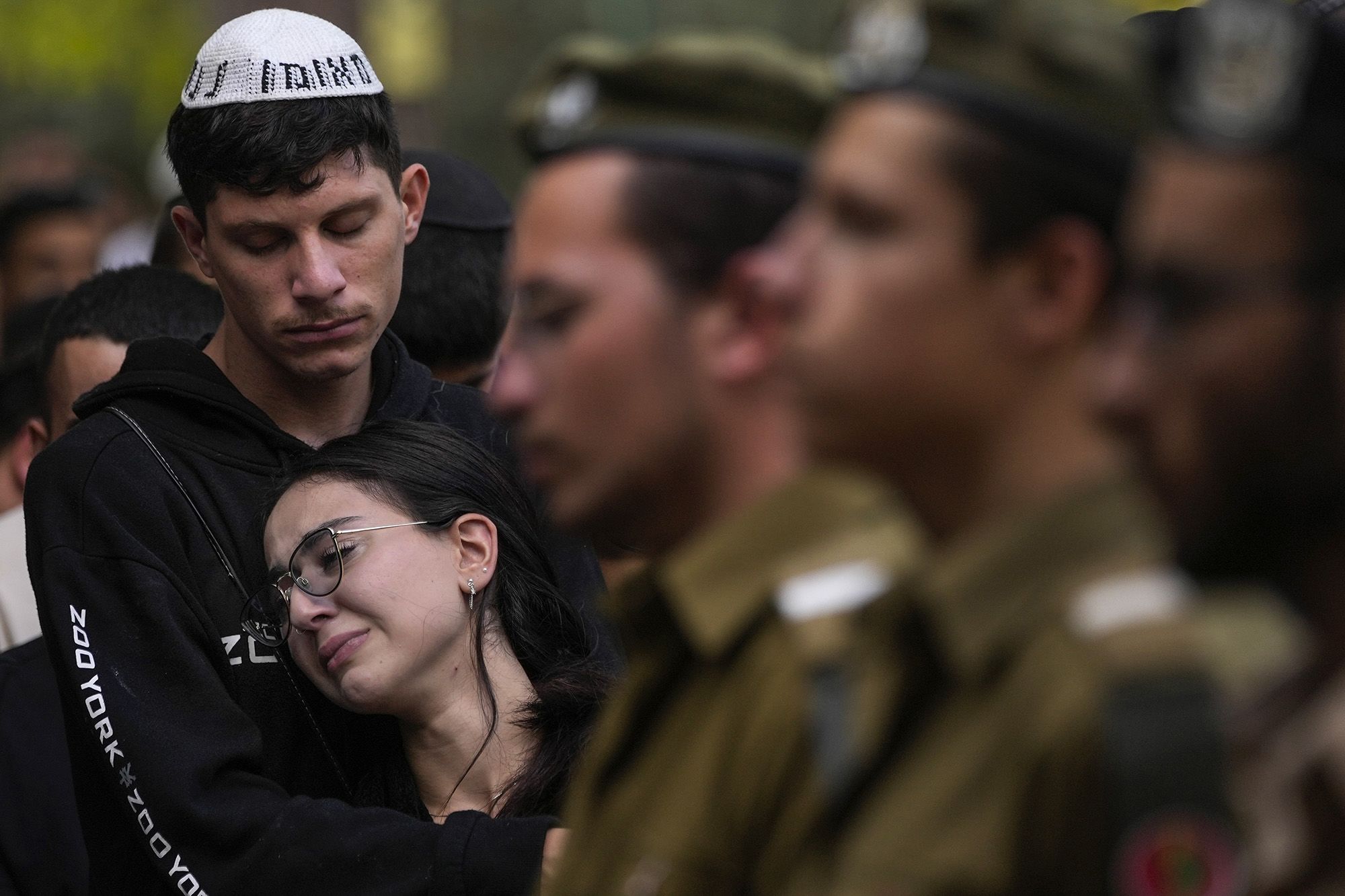 Mourners attend the funeral of Israeli soldier Abraham Cohen at the Mount Herzl cemetery in Jerusalem on Thursday, October 12.
