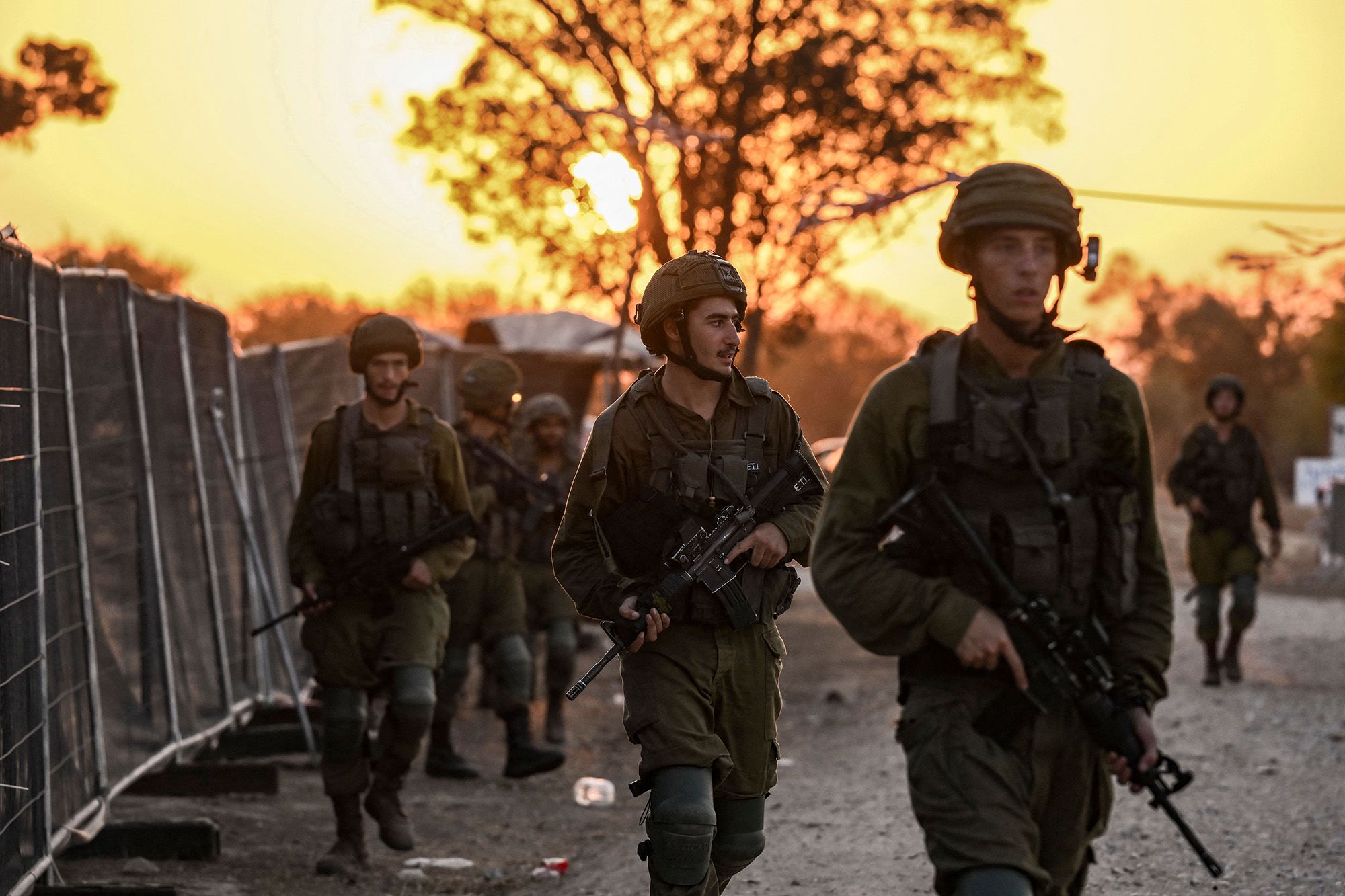 Israeli soldiers patrol near Kibbutz Be'eri, Israel, on October 12.