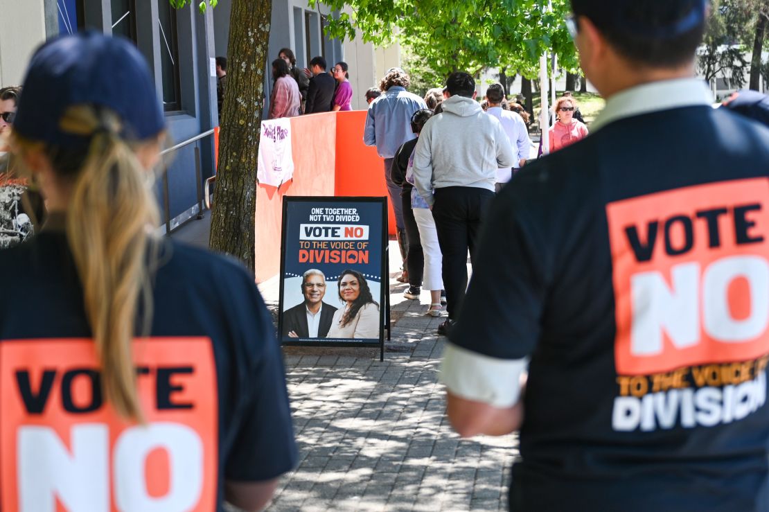 "Vote No" volunteers at a polling center in Canberra on October 13, 2023.