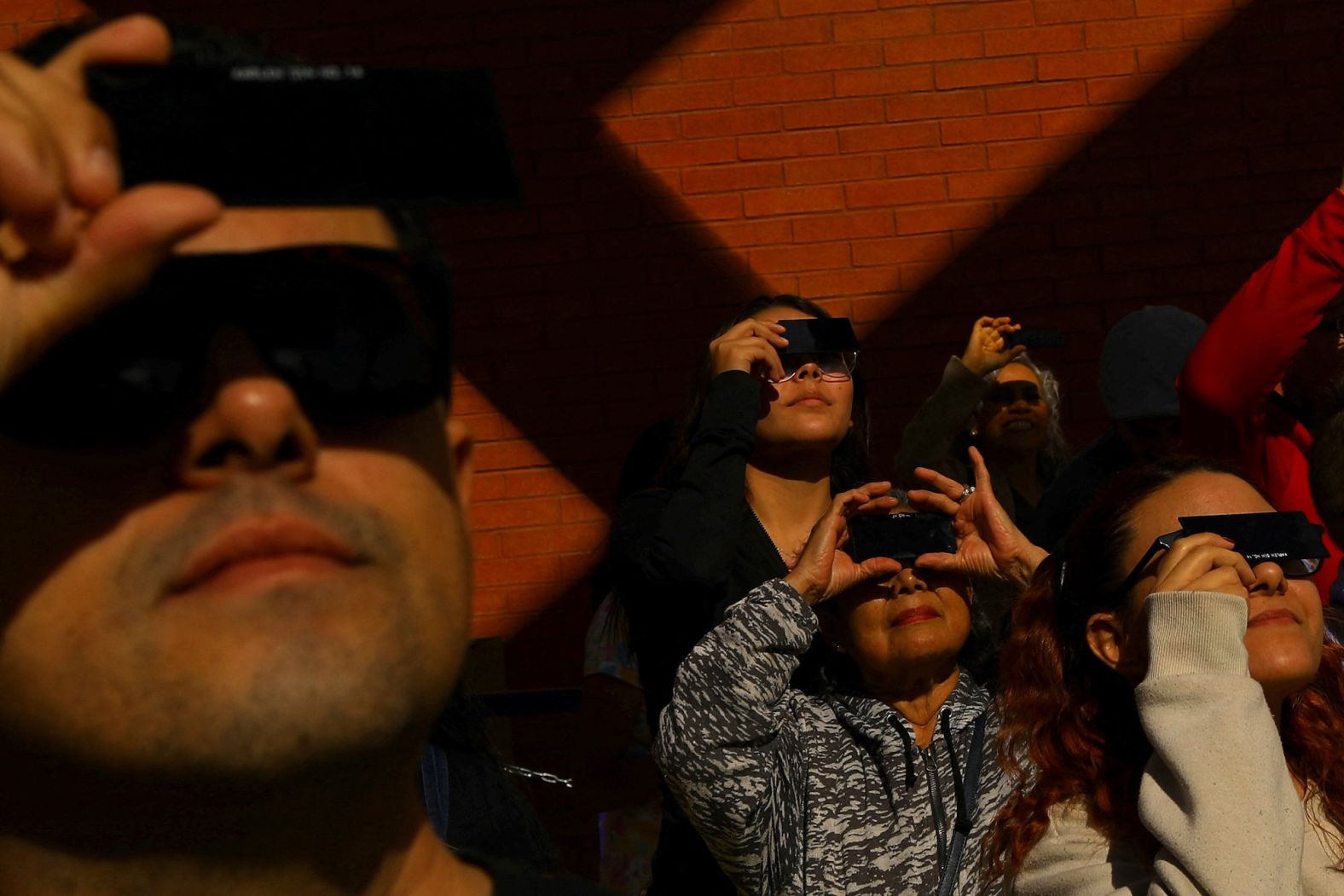 Crowds gather to watch the solar eclipse at a museum in Ciudad Juarez, Mexico.