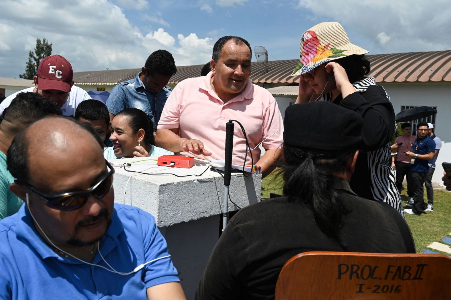 Blind people experience the annular eclipse through sound by using a device called LightSound in Tegucigalpa, Honduras.