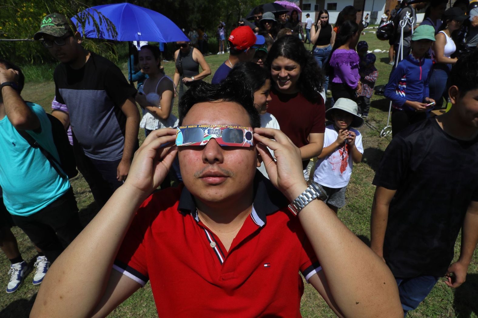 A man observes the eclipse in Tegucigalpa, Honduras.
