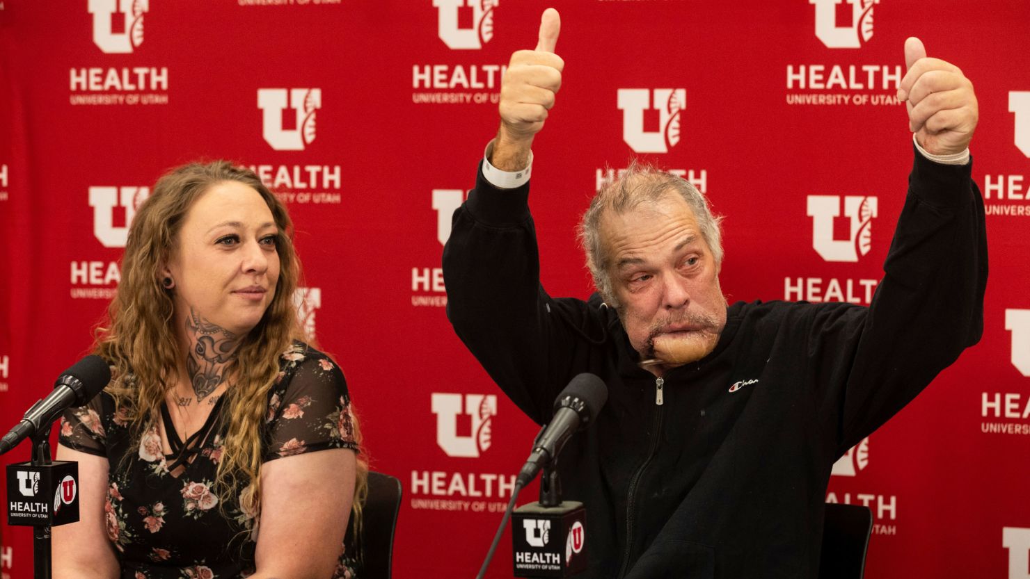 Rudy Noorlander, right, gives two thumbs up at a news conference with his daughter, Ashley Noorlander.