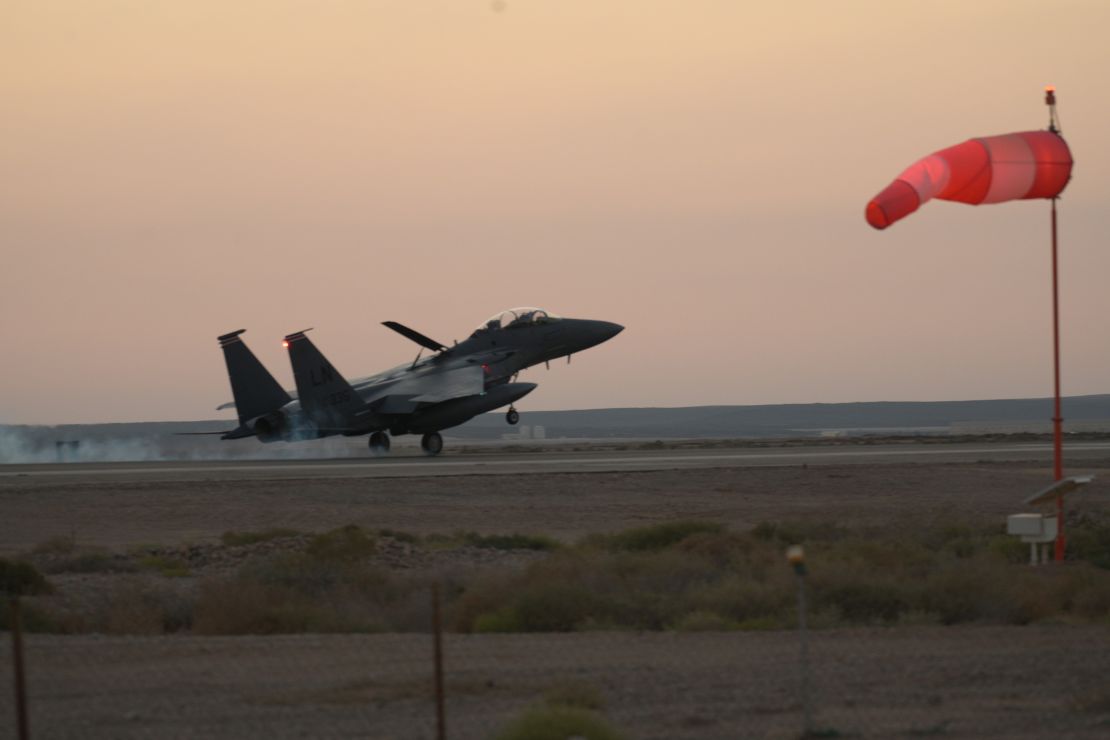 A US Air Force F-15E Strike Eagle assigned to the 494th Expeditionary Fighter Squadron "Mighty Black Panthers" lands in the U.S. Central Command area of operations, Oct. 13, 2023.