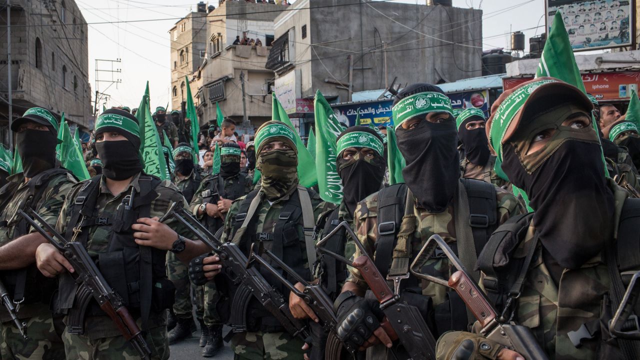 In this 2017 photo, Palestinian Hamas militants are seen during a military show in the Bani Suheila district in Gaza City, Gaza.