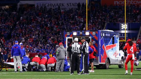 An ambulance waits on the field as medical staff attend to Buffalo Bills running back Damien Harris during the first half of an NFL football game against the New York Giants in Orchard Park, N.Y., Sunday Oct. 15, 2023. (AP Photo/ Jeffrey T. Barnes)