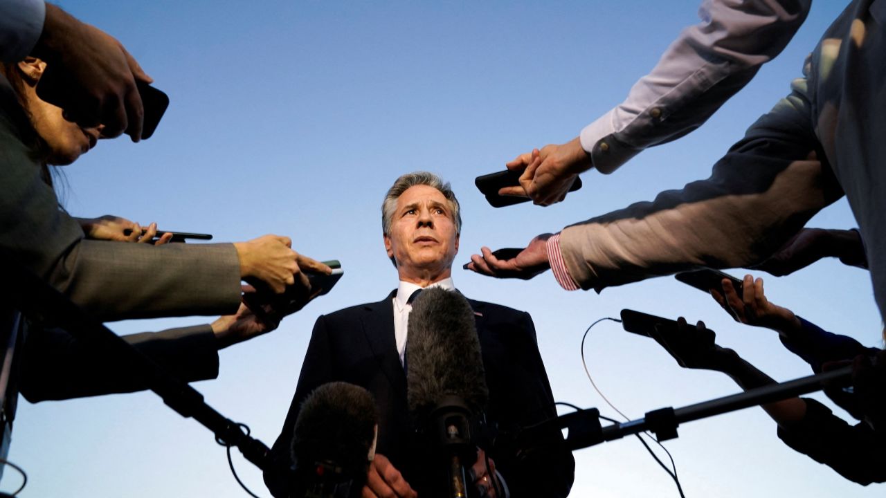 US Secretary of State Antony Blinken speaks to members of the media before leaving Cairo, Egypt, on October 15, en route to Jordan.