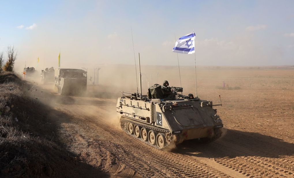 Israeli armored personnel carriers maneuver in southern Israel, on October 15. 