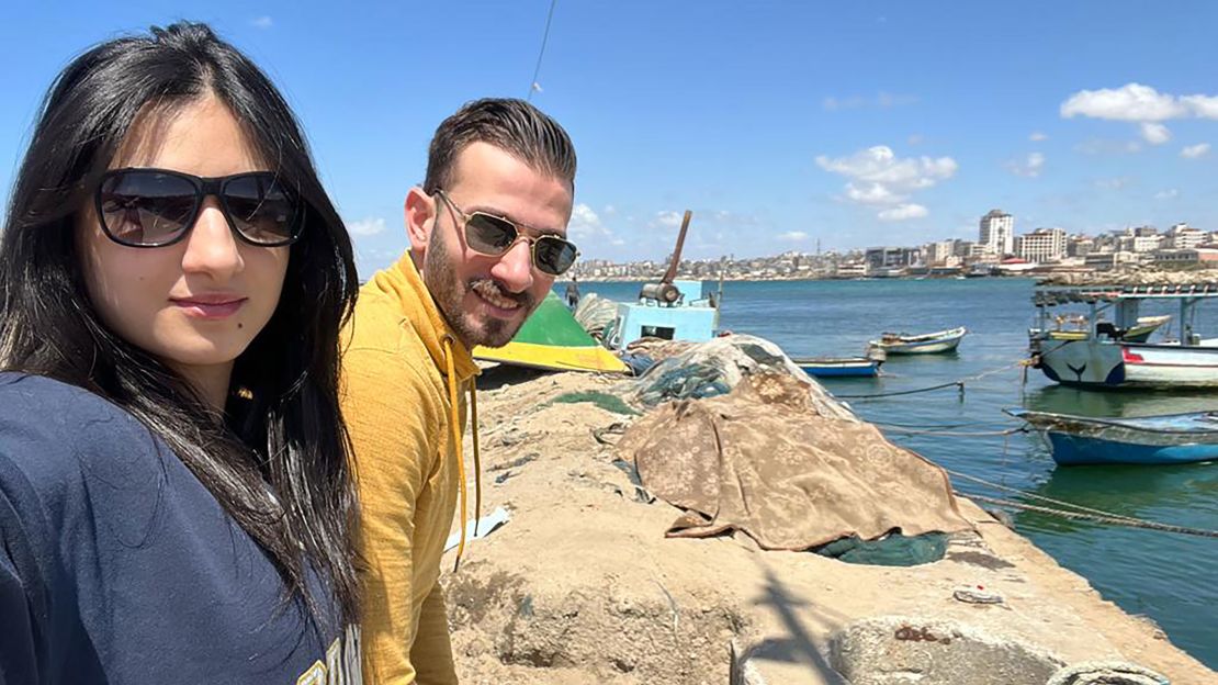 Nardeen Fares, 27, takes a selfie with her husband at Gaza Port, near Gaza City, in the Gaza Strip in May 2023.